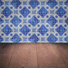 Image showing Wood table top and blur vintage ceramic tile pattern wall