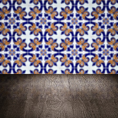 Image showing Wood table top and blur vintage ceramic tile pattern wall