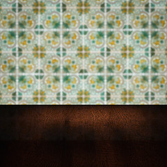 Image showing Wood table top and blur vintage ceramic tile pattern wall