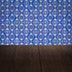 Image showing Wood table top and blur vintage ceramic tile pattern wall