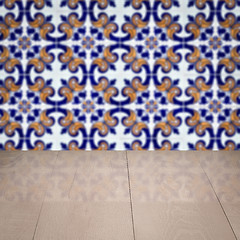 Image showing Wood table top and blur vintage ceramic tile pattern wall