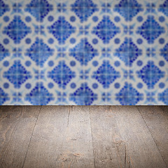 Image showing Wood table top and blur vintage ceramic tile pattern wall