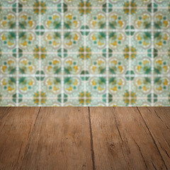 Image showing Wood table top and blur vintage ceramic tile pattern wall