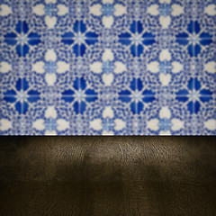 Image showing Wood table top and blur vintage ceramic tile pattern wall