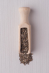 Image showing Wooden scoop with chia seeds