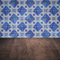 Image showing Wood table top and blur vintage ceramic tile pattern wall