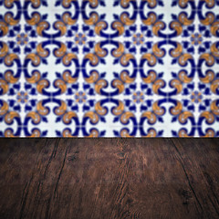 Image showing Wood table top and blur vintage ceramic tile pattern wall