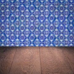 Image showing Wood table top and blur vintage ceramic tile pattern wall