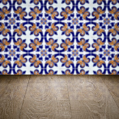 Image showing Wood table top and blur vintage ceramic tile pattern wall