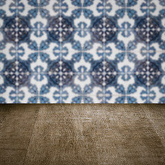 Image showing Wood table top and blur vintage ceramic tile pattern wall