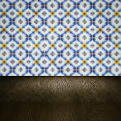 Image showing Wood table top and blur vintage ceramic tile pattern wall