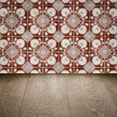 Image showing Wood table top and blur vintage ceramic tile pattern wall