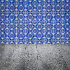 Image showing Wood table top and blur vintage ceramic tile pattern wall