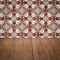 Image showing Wood table top and blur vintage ceramic tile pattern wall