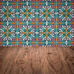 Image showing Wood table top and blur vintage ceramic tile pattern wall