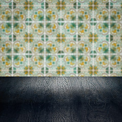 Image showing Wood table top and blur vintage ceramic tile pattern wall