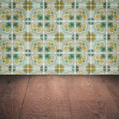 Image showing Wood table top and blur vintage ceramic tile pattern wall