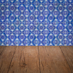 Image showing Wood table top and blur vintage ceramic tile pattern wall