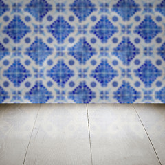 Image showing Wood table top and blur vintage ceramic tile pattern wall