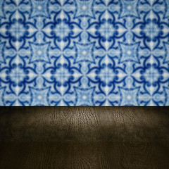 Image showing Wood table top and blur vintage ceramic tile pattern wall