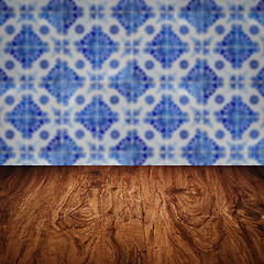 Image showing Wood table top and blur vintage ceramic tile pattern wall