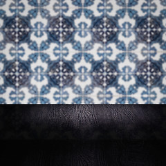 Image showing Wood table top and blur vintage ceramic tile pattern wall