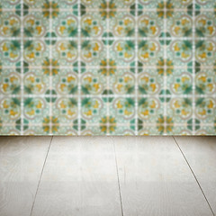 Image showing Wood table top and blur vintage ceramic tile pattern wall