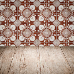 Image showing Wood table top and blur vintage ceramic tile pattern wall