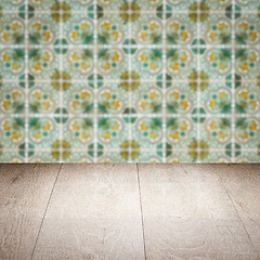 Image showing Wood table top and blur vintage ceramic tile pattern wall