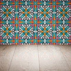 Image showing Wood table top and blur vintage ceramic tile pattern wall