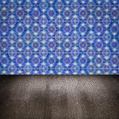 Image showing Wood table top and blur vintage ceramic tile pattern wall