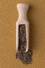 Image showing Wooden scoop with chia seeds