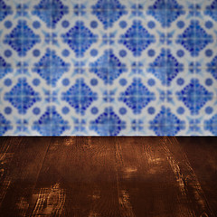 Image showing Wood table top and blur vintage ceramic tile pattern wall