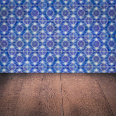 Image showing Wood table top and blur vintage ceramic tile pattern wall