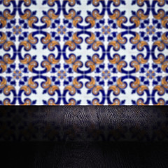 Image showing Wood table top and blur vintage ceramic tile pattern wall