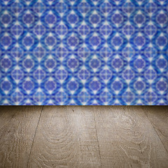 Image showing Wood table top and blur vintage ceramic tile pattern wall