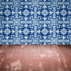 Image showing Wood table top and blur vintage ceramic tile pattern wall