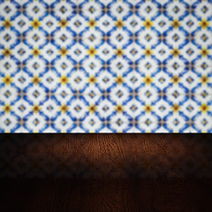 Image showing Wood table top and blur vintage ceramic tile pattern wall