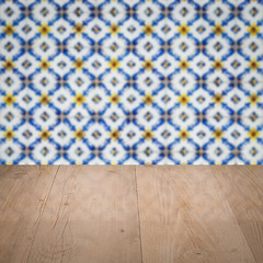 Image showing Wood table top and blur vintage ceramic tile pattern wall