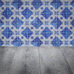 Image showing Wood table top and blur vintage ceramic tile pattern wall