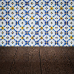 Image showing Wood table top and blur vintage ceramic tile pattern wall