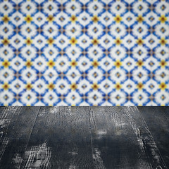 Image showing Wood table top and blur vintage ceramic tile pattern wall