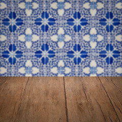 Image showing Wood table top and blur vintage ceramic tile pattern wall