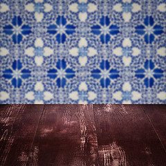 Image showing Wood table top and blur vintage ceramic tile pattern wall