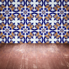 Image showing Wood table top and blur vintage ceramic tile pattern wall