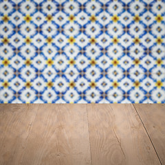 Image showing Wood table top and blur vintage ceramic tile pattern wall