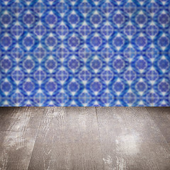 Image showing Wood table top and blur vintage ceramic tile pattern wall