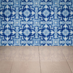 Image showing Wood table top and blur vintage ceramic tile pattern wall