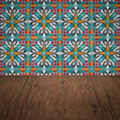 Image showing Wood table top and blur vintage ceramic tile pattern wall