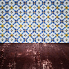 Image showing Wood table top and blur vintage ceramic tile pattern wall